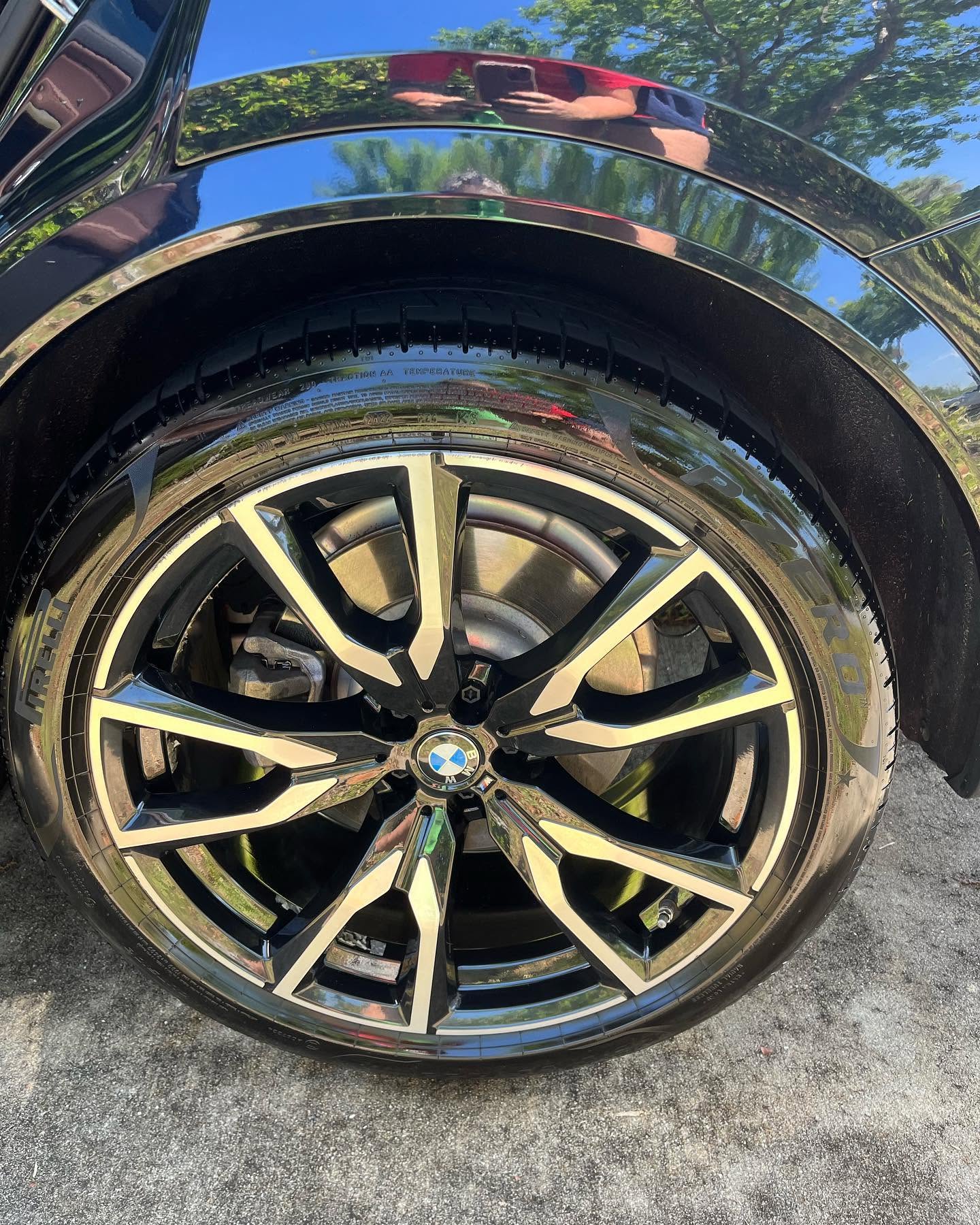 Gleaming BMW wheel and tire after wheel detailing