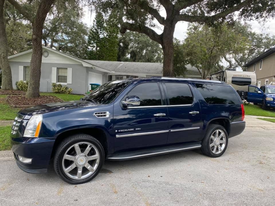 Blue Cadillac Escalade ESV after exterior detailing