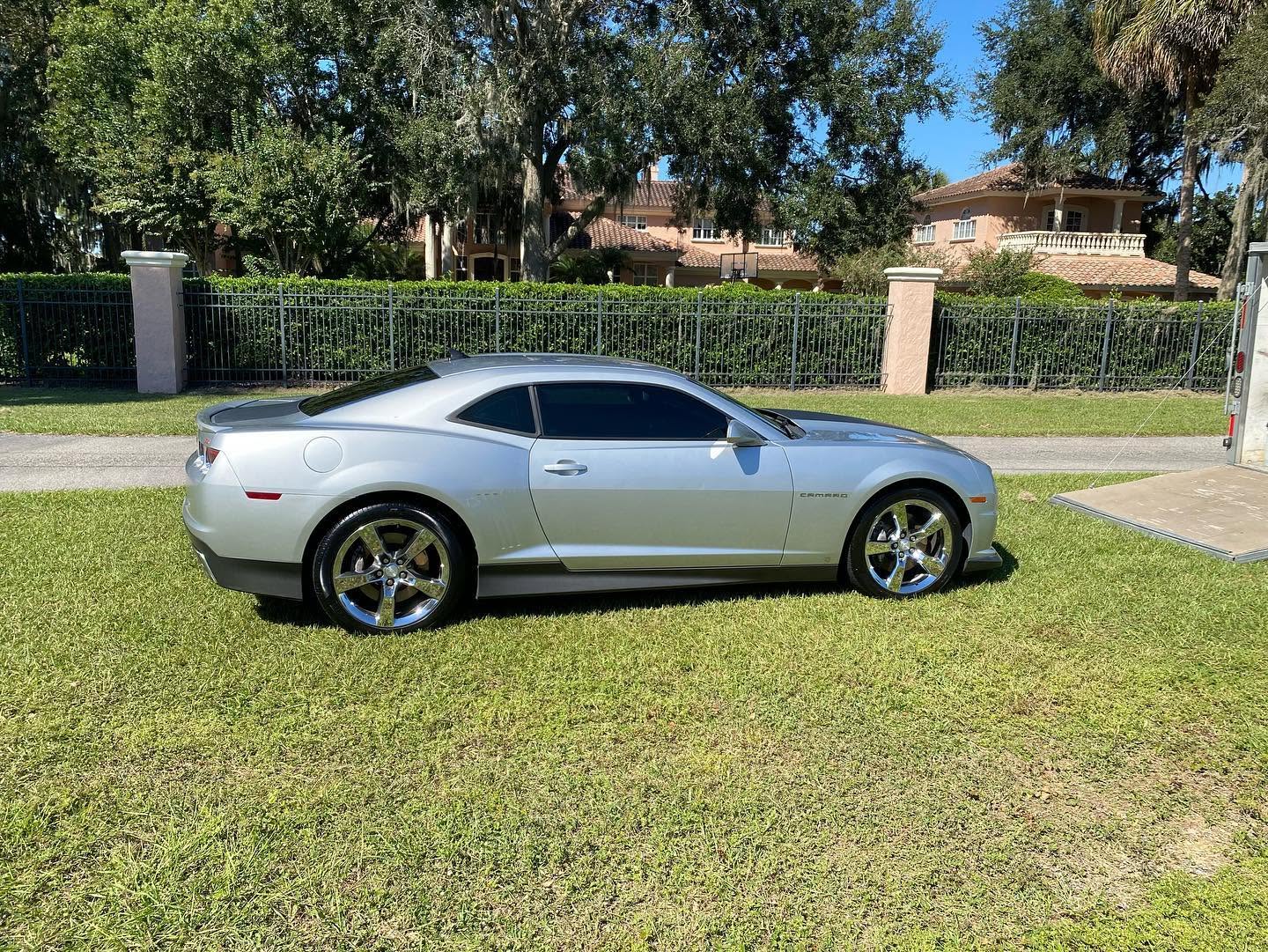 Silver Chevrolet Camaro SS with flawless paint after paint correction