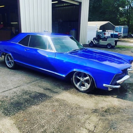Electric blue classic Buick Riviera with show shine