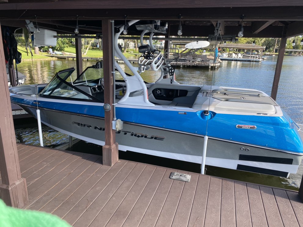 Air Nautique wakeboard boat detailed in its boathouse