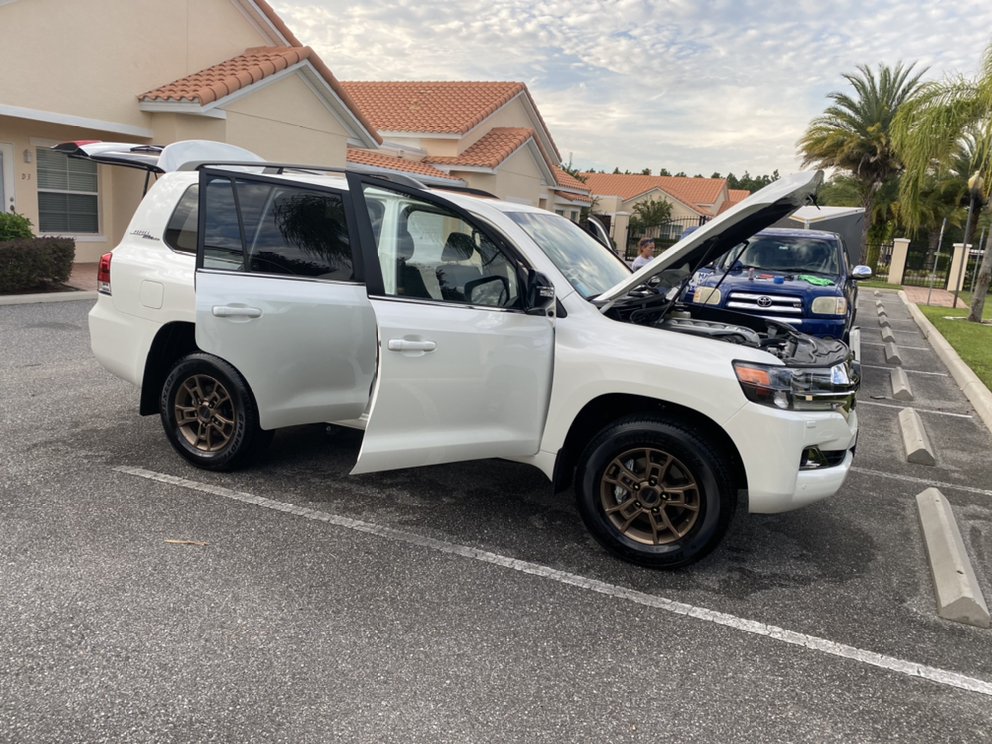 White Toyota Land Cruiser during a full mobile detail